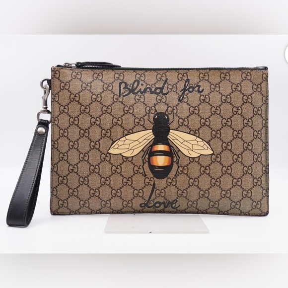 Gucci Handbags - Gucci Tan Clutch with Bee Motif